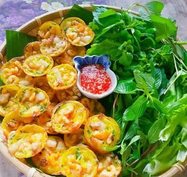 Vì sao gọi là bánh gật gù, bánh khọt?